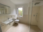 Badezimmer - Erstbezug, moderne 3 Zimmer Neubauwohnung in beliebter Wohnlage von Bad Zwischenahn