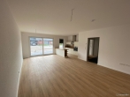 Wohnzimmer - Erstbezug, moderne 3 Zimmer Neubauwohnung in beliebter Wohnlage von Bad Zwischenahn