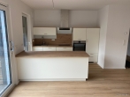 Einbauküche - Erstbezug, moderne 3 Zimmer Neubauwohnung in beliebter Wohnlage von Bad Zwischenahn
