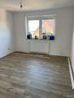 Verkauft ! Großzügige sanierte Zwei-Zimmerwohnung in Bad Zwischenahn - Beispielboden Schlafzimmer