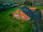 Einfamilienhaus auf ca. 3500 qm Grundstück in Edewecht-Husbäke - Hausansicht